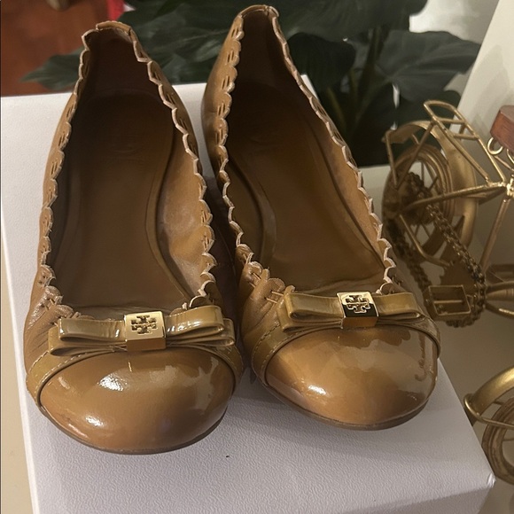 Tory Burch Shoes - Tory Burch Camel Flats with Gold Bow. Pls send me offers!!